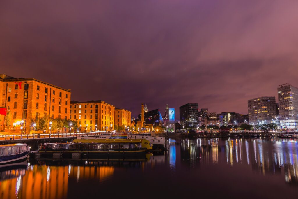 Liverpool city by the river at night.